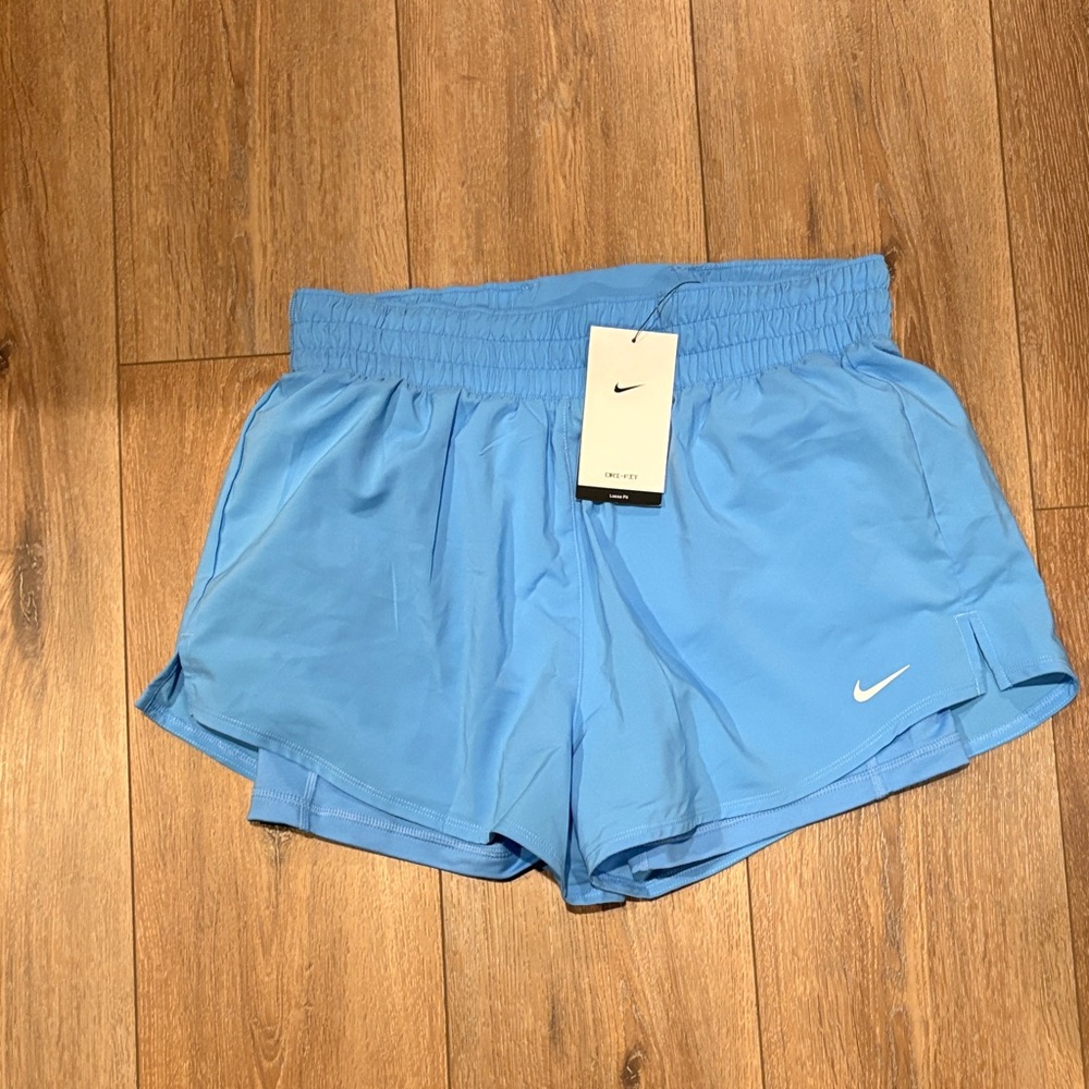 NWT women’s Nike blue medium athletic running shorts